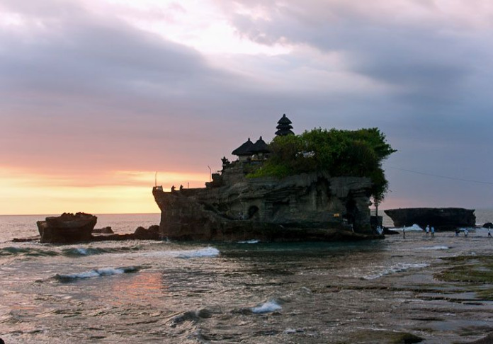 Tanah Lot temple in Bali, where the waves come to grips with the land